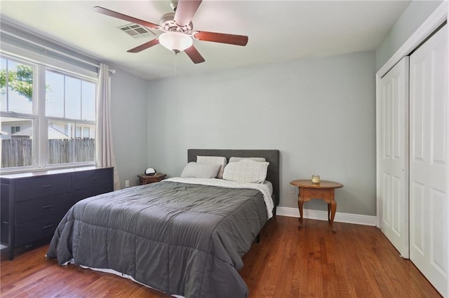 528 Carrollton Ave, Metairie, LA 70005 - bedroom featuring a closet, wood finished floors, and ceiling fan