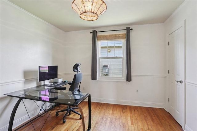 528 Carrollton Ave, Metairie, LA 70005 - office with light wood-type flooring, a chandelier, and crown molding