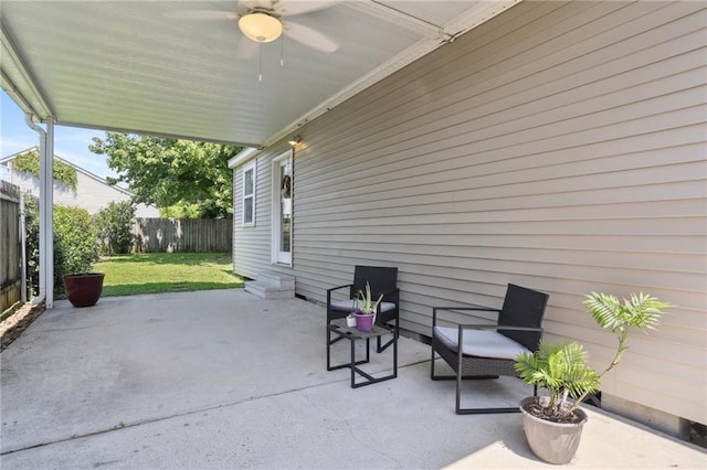 528 Carrollton Ave, Metairie, LA 70005 - fenced backyard featuring a ceiling fan and a patio area