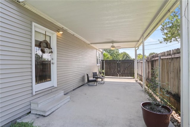 528 Carrollton Ave, Metairie, LA 70005 - view of patio with a ceiling fan and a carport