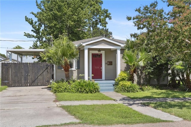 528 Carrollton Ave, Metairie, LA 70005 - view of front of property with driveway and a carport