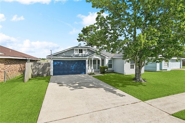 304 Jeffer Dr, Waggaman, LA 70094 - view of front facade with concrete driveway and an attached garage