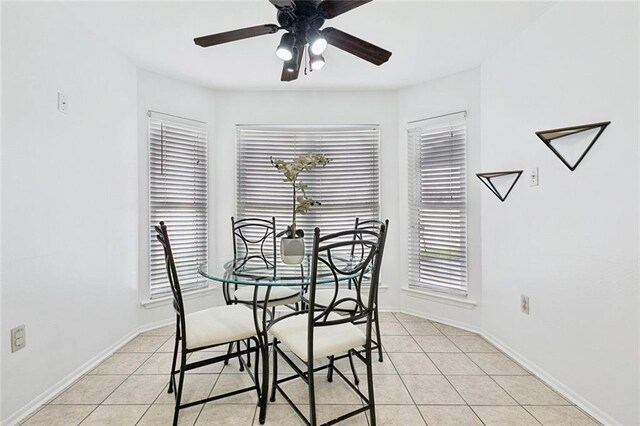 304 Jeffer Dr, Waggaman, LA 70094 - dining space featuring light tile patterned floors, a ceiling fan, and healthy amount of natural light