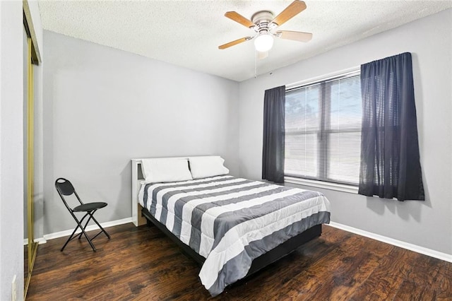 304 Jeffer Dr, Waggaman, LA 70094 - bedroom featuring wood finished floors, ceiling fan, and a textured ceiling