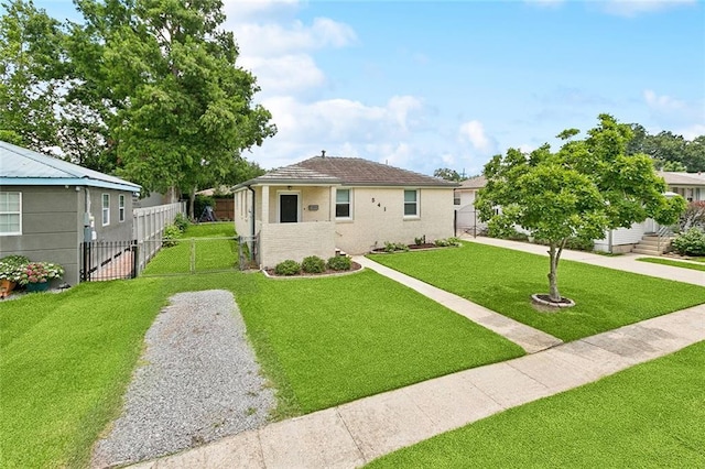 541 Gelpi Ave, Jefferson, LA 70121 - view of front of house featuring a gate, driveway, and brick siding