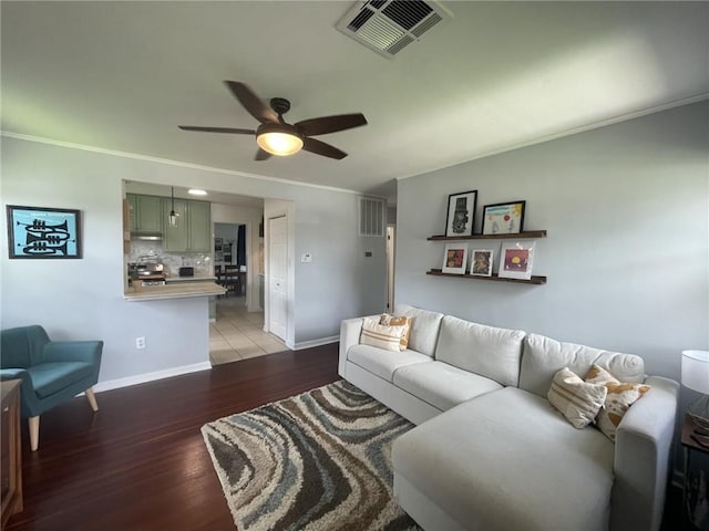 541 Gelpi Ave, Jefferson, LA 70121 - living room featuring ceiling fan, light wood finished floors, and ornamental molding