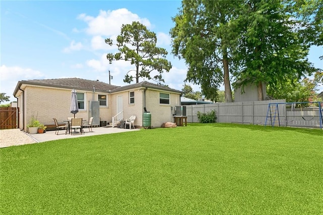 541 Gelpi Ave, Jefferson, LA 70121 - back of property featuring entry steps, a fenced backyard, a patio, and brick siding