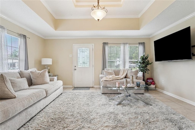 128 Marilyn Dr, Slidell, LA 70461 - living area with a tray ceiling, tile patterned floors, and crown molding