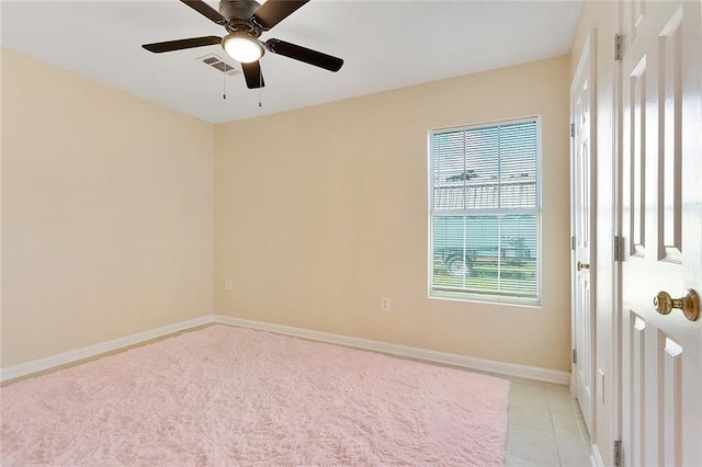 128 Marilyn Dr, Slidell, LA 70461 - spare room featuring ceiling fan and light tile patterned floors