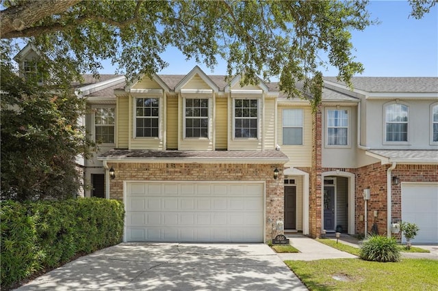505 Rose St, Metairie, LA 70005 - view of property with driveway, a garage, roof with shingles, and brick siding