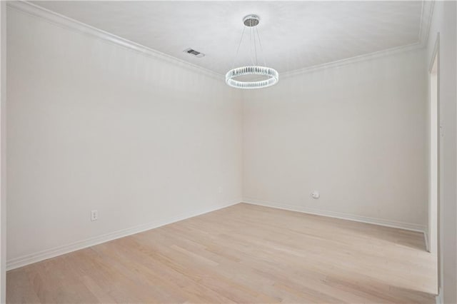 505 Rose St, Metairie, LA 70005 - empty room featuring crown molding and light wood-style floors
