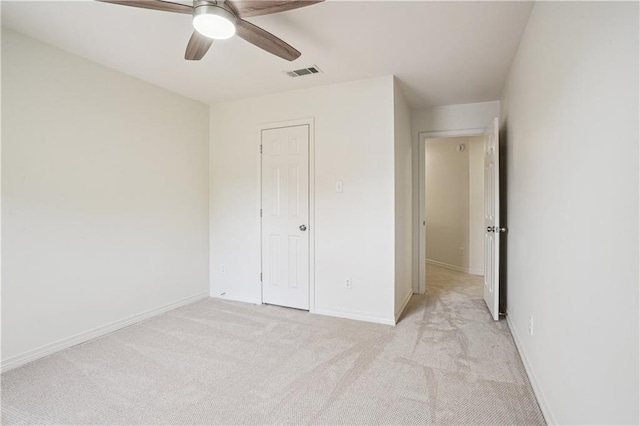 505 Rose St, Metairie, LA 70005 - unfurnished bedroom with light colored carpet and a ceiling fan