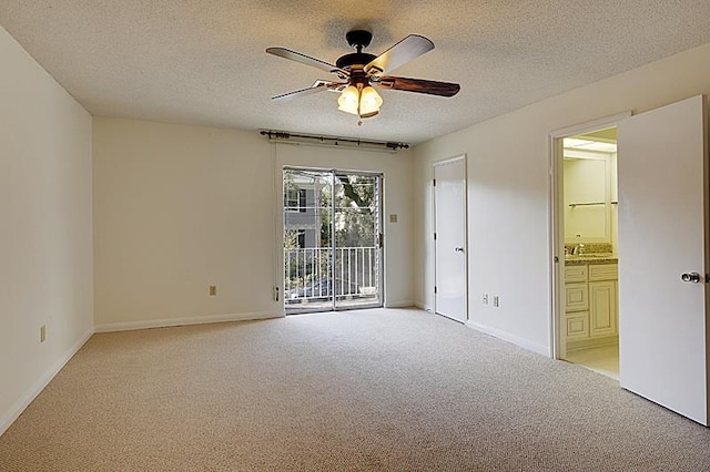 4433-35 Carondelet St, New Orleans, LA 70115 - unfurnished room featuring light colored carpet, a ceiling fan, and a textured ceiling