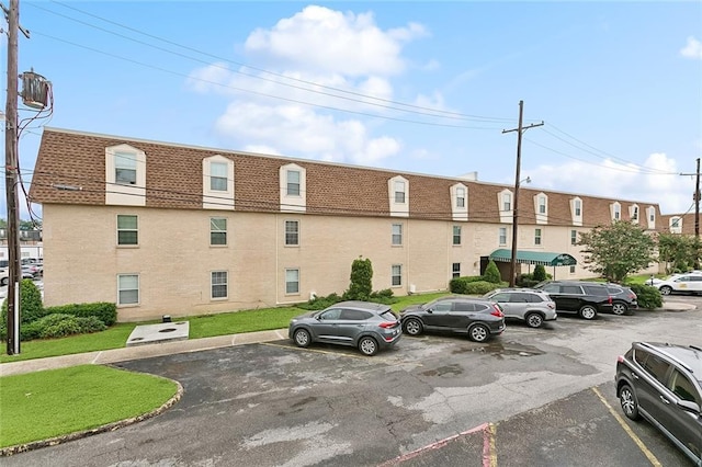2704 Whitney Pl Unit 922, Metairie, LA 70002 - view of building exterior with uncovered parking