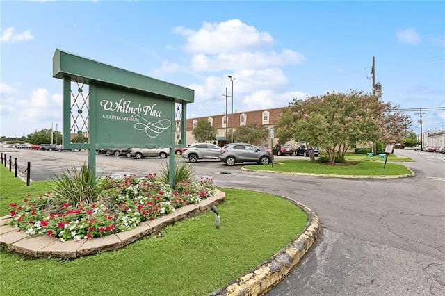 2704 Whitney Pl Unit 922, Metairie, LA 70002 - community sign featuring uncovered parking and a lawn