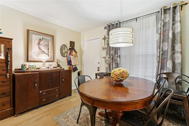 2704 Whitney Pl Unit 922, Metairie, LA 70002 - dining area featuring light wood-style floors