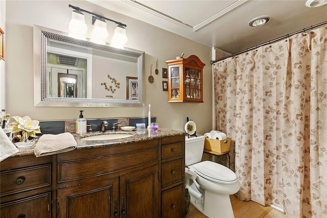 2704 Whitney Pl Unit 922, Metairie, LA 70002 - bathroom featuring vanity, wood finished floors, and a shower with shower curtain
