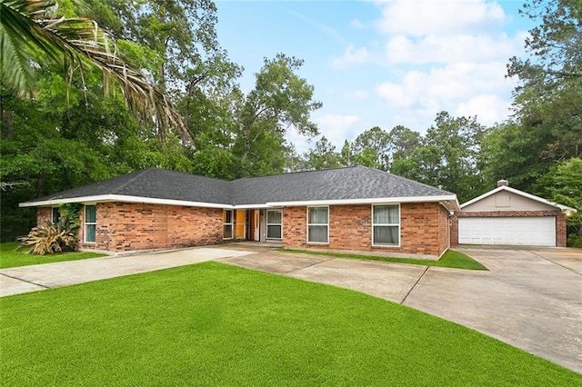 127 Herwig Bluff Rd, Slidell, LA 70461 - ranch-style house featuring an outdoor structure, brick siding, a garage, and a front lawn