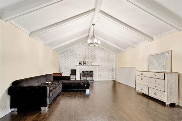 127 Herwig Bluff Rd, Slidell, LA 70461 - living room with a chandelier, dark wood-style floors, a large fireplace, and brick wall