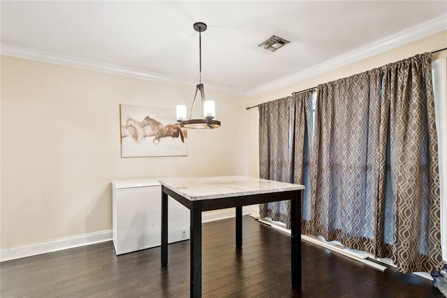 127 Herwig Bluff Rd, Slidell, LA 70461 - unfurnished dining area with ornamental molding, wood finished floors, and a chandelier