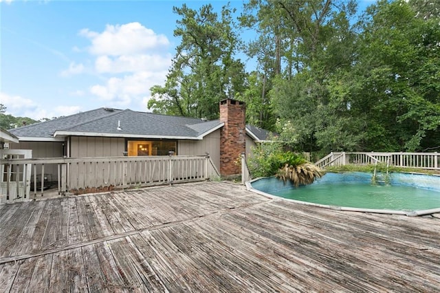 127 Herwig Bluff Rd, Slidell, LA 70461 - wooden terrace with an outdoor pool