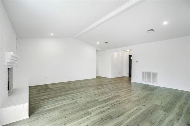 1408 N Sugar Ridge Rd, La Place, LA 70068 - unfurnished living room with a fireplace and wood finished floors