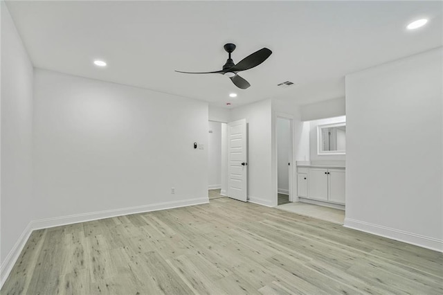 1408 N Sugar Ridge Rd, La Place, LA 70068 - spare room with a ceiling fan, light wood-style flooring, and recessed lighting