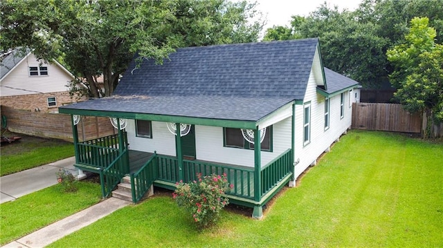 524 Camelia Ave, La Place, LA 70068 - view of front of house with a shingled roof and a porch