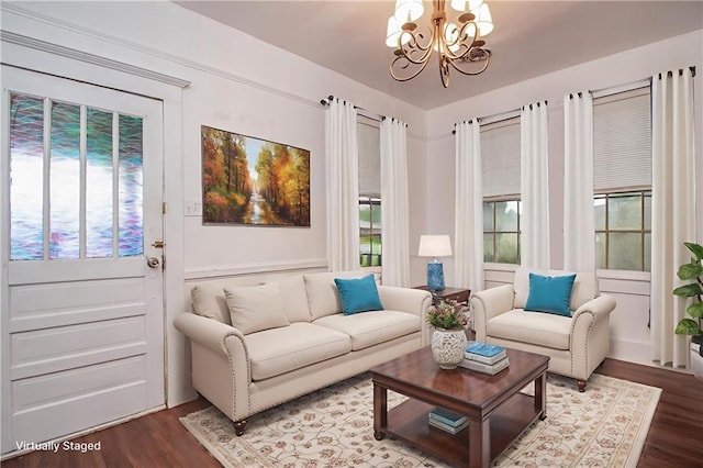 524 Camelia Ave, La Place, LA 70068 - living area with healthy amount of natural light, a chandelier, and dark wood-style floors