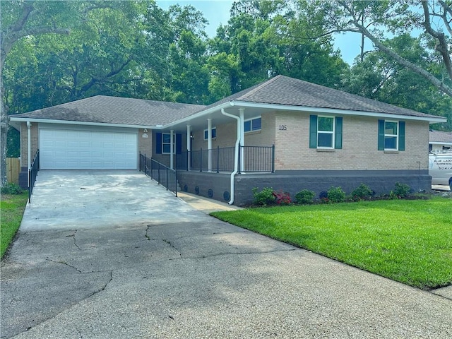 105 Kempsey Ct, Slidell, LA 70458 - ranch-style house with brick siding, concrete driveway, a front lawn, a garage, and a porch