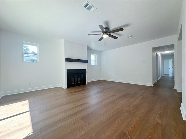 105 Kempsey Ct, Slidell, LA 70458 - unfurnished living room with ceiling fan, a fireplace, and dark wood-style flooring