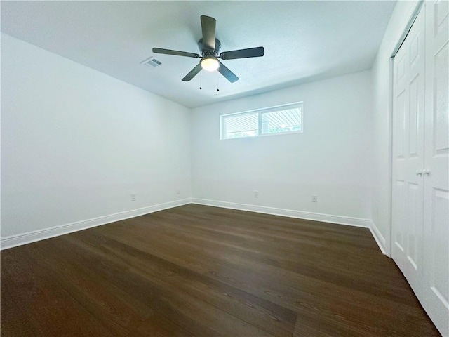 105 Kempsey Ct, Slidell, LA 70458 - unfurnished bedroom featuring dark wood-style flooring, a closet, and a ceiling fan