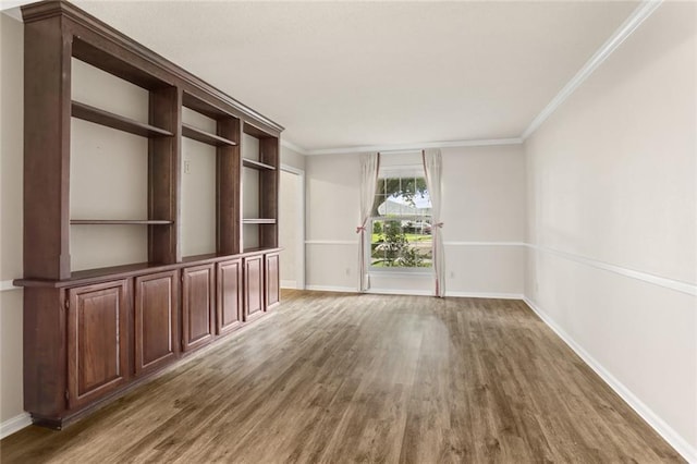 1524 Peach St, Metairie, LA 70001 - unfurnished living room with wood finished floors and crown molding