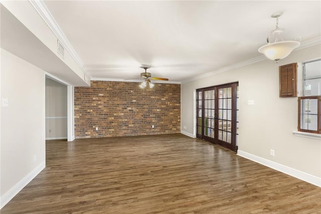 1524 Peach St, Metairie, LA 70001 - unfurnished living room featuring a ceiling fan, healthy amount of natural light, brick wall, french doors, and ornamental molding