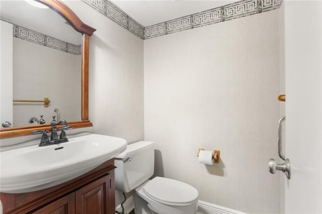 1524 Peach St, Metairie, LA 70001 - half bathroom featuring vanity and a textured ceiling