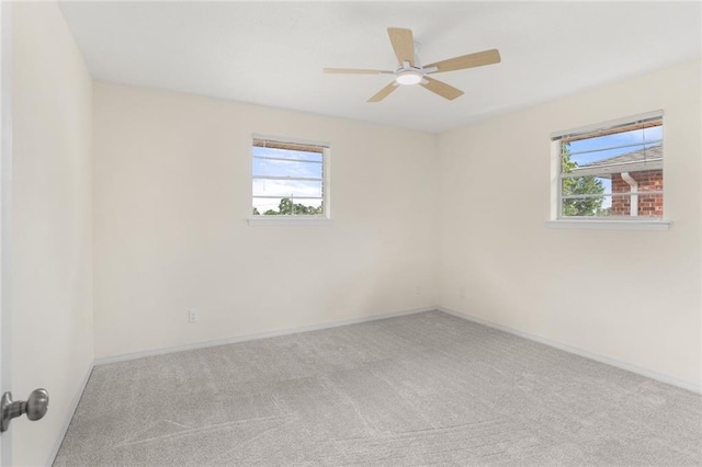 1524 Peach St, Metairie, LA 70001 - unfurnished room featuring carpet flooring, plenty of natural light, and ceiling fan