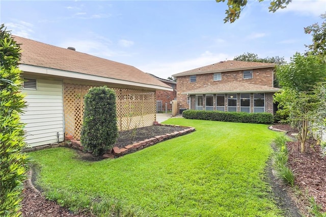 1524 Peach St, Metairie, LA 70001 - view of green lawn featuring a sunroom
