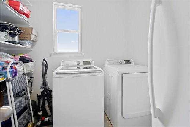 28794 Berry Todd Rd, Lacombe, LA 70445 - laundry room featuring washer and clothes dryer