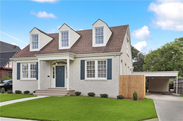 3222 Octavia St, New Orleans, LA 70125 - cape cod house with brick siding, driveway, and roof with shingles