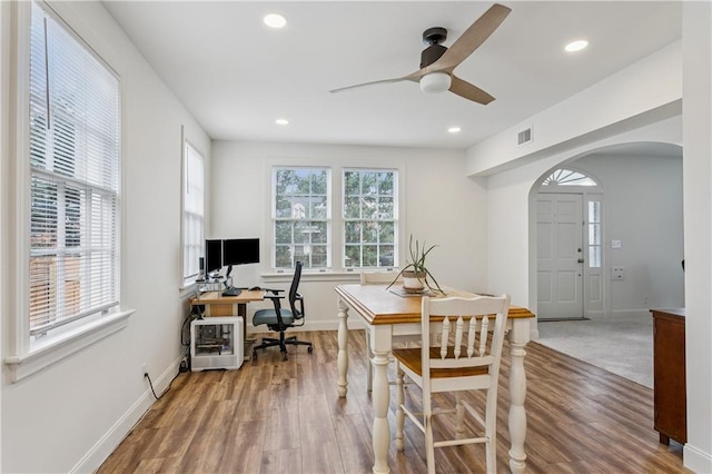 3222 Octavia St, New Orleans, LA 70125 - office space with ceiling fan, arched walkways, wood finished floors, and recessed lighting