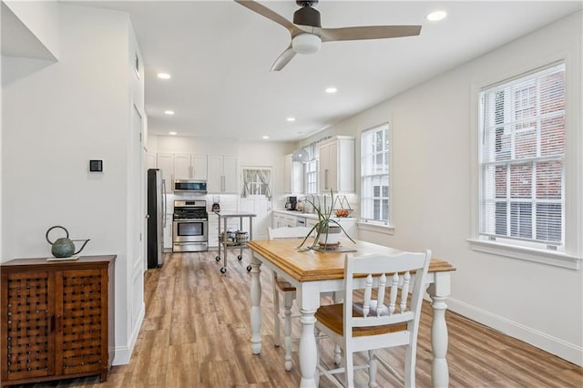 3222 Octavia St, New Orleans, LA 70125 - dining area featuring a ceiling fan, light wood-style flooring, and recessed lighting