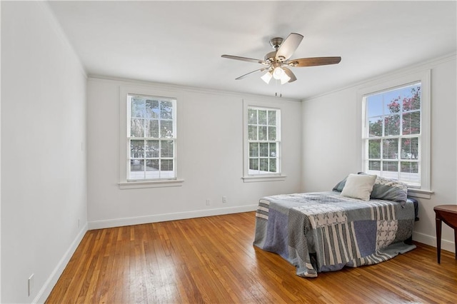 3222 Octavia St, New Orleans, LA 70125 - bedroom with hardwood / wood-style flooring and a ceiling fan