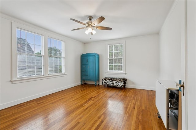 3222 Octavia St, New Orleans, LA 70125 - unfurnished room with light wood-type flooring, a ceiling fan, and crown molding