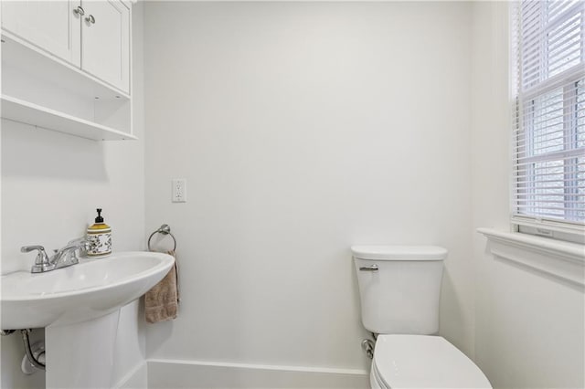 3222 Octavia St, New Orleans, LA 70125 - bathroom featuring toilet and baseboards