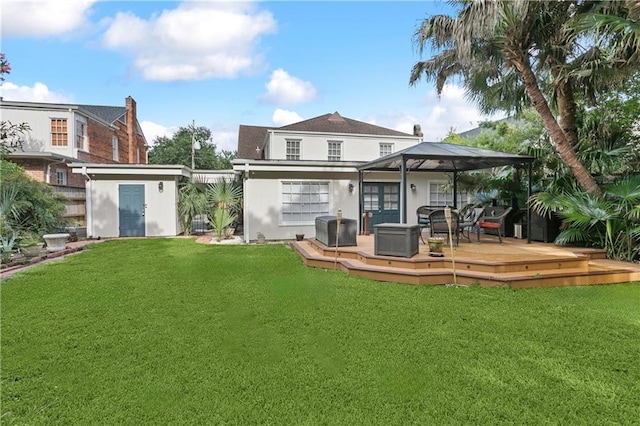 3222 Octavia St, New Orleans, LA 70125 - back of house featuring a gazebo, a wooden deck, and a yard