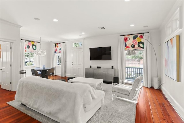 901 Henry Clay Ave, New Orleans, LA 70118 - living room with wood finished floors, recessed lighting, a chandelier, and ornamental molding