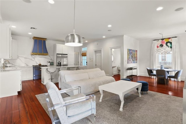 901 Henry Clay Ave, New Orleans, LA 70118 - living room with dark wood-type flooring and recessed lighting