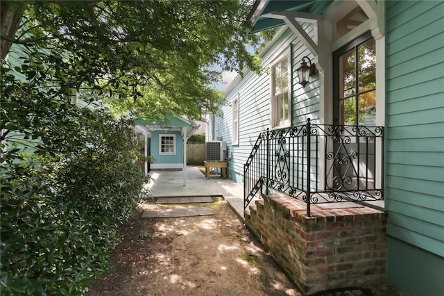 901 Henry Clay Ave, New Orleans, LA 70118 - view of side of property with a central AC unit