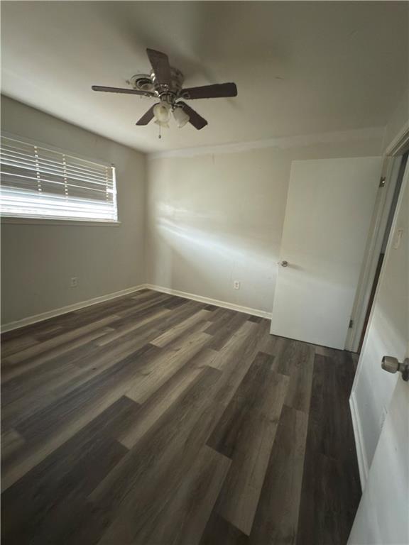 220810 Kraft Pl, New Orleans, LA 70114 - unfurnished room featuring a ceiling fan and wood finished floors