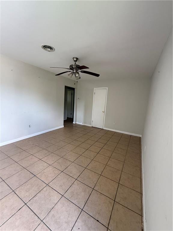 220810 Kraft Pl, New Orleans, LA 70114 - spare room featuring ceiling fan and light tile patterned flooring